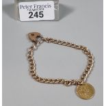 15ct gold curb link bracelet with 15ct heart shaped padlock and a Spanish gold coin, República de