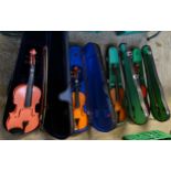 Box containing three cased student violas and one student violin to include: two Stentor student