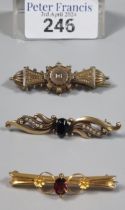 Edwardian design 9ct gold and red stone bar brooch together with a Victorian gold and silver