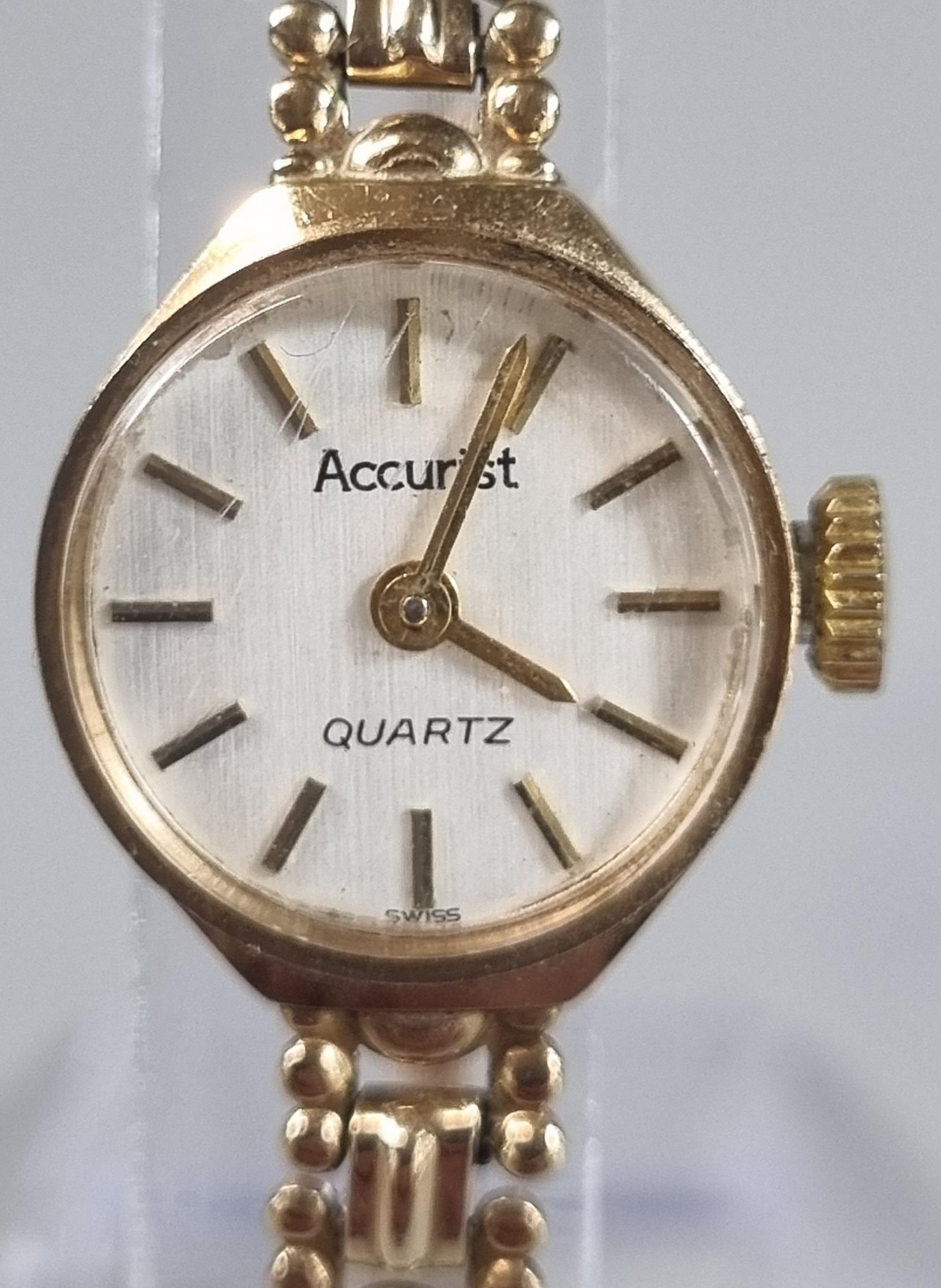 Accurist 9ct gold small head ladies wristwatch with satin face having baton numerals on a 9ct gold - Image 3 of 3