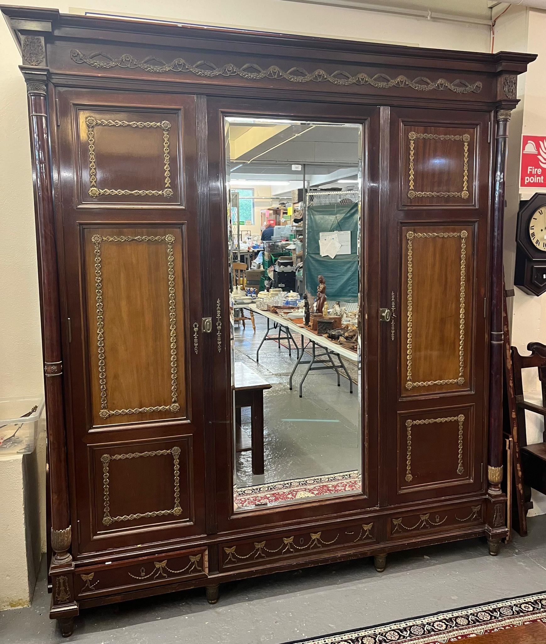 Good quality early 20tyh century French design mahogany three section wardrobe with mirrored