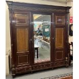 Good quality early 20tyh century French design mahogany three section wardrobe with mirrored