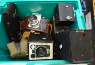 Box of vintage cameras to include: various Kodak Brownie box cameras, Exakta Jhagee Dresden, tripods