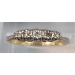 Gold, probably 18ct, five stone diamond ring (indistinct hallmarks). 2g approx. Size L1/2. (B.P. 21%