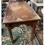 Two similar late Victorian pitch pine Gothic design tables. (2) (B.P. 21% + VAT)