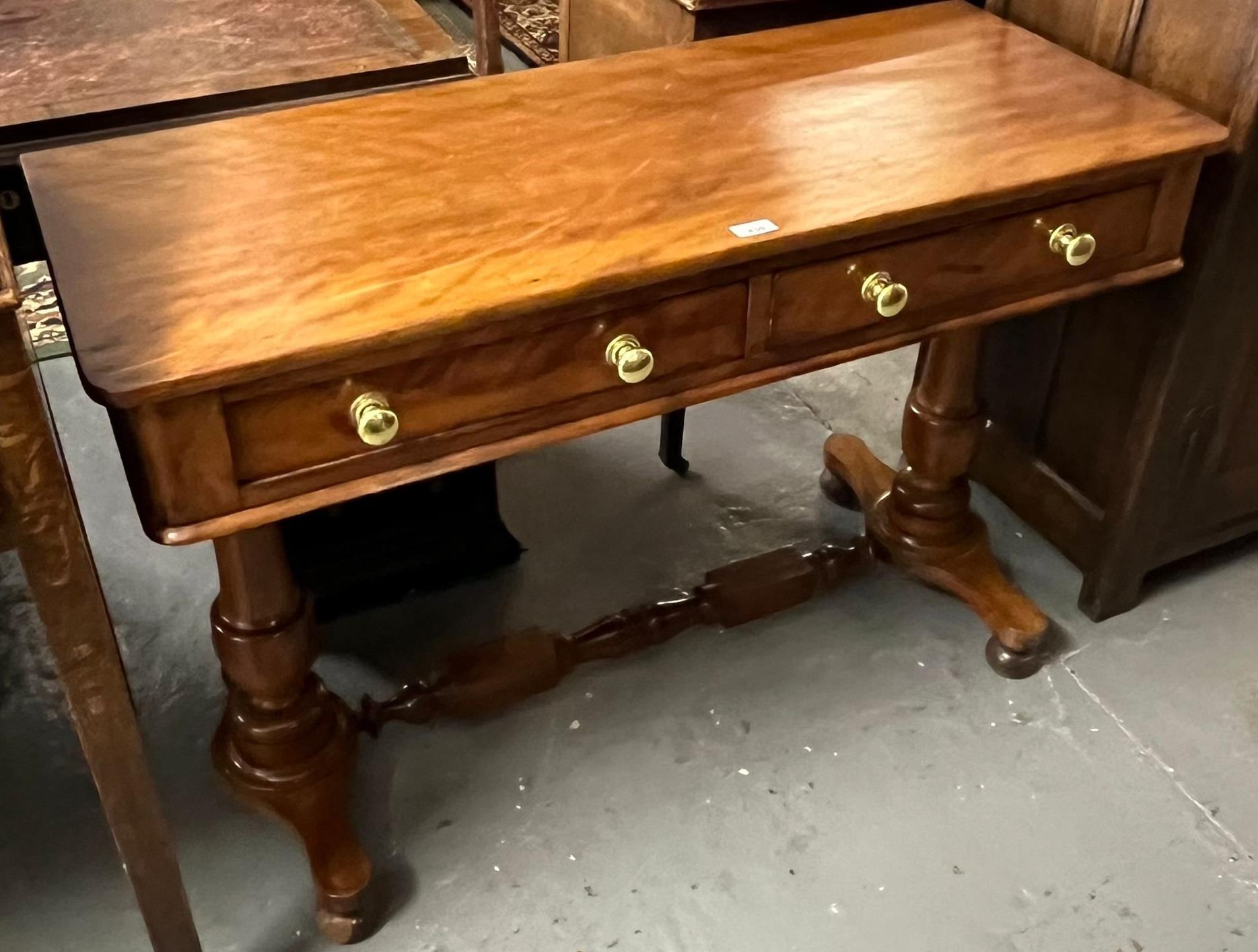 Victorian stretcher table, the moulded top above two drawers on baluster turned supports and central