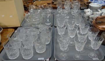 Four trays of glassware to include some Waterford; wine glasses, champagne flutes, milk jug etc,