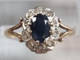 9ct gold diamond and sapphire ring. 2.2g approx. Size O1/2. (B.P. 21% + VAT)