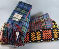 Vintage woollen black ground Welsh tapestry blanket with Caernarfon design and fringed edge,