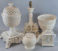 Collection of Royal Creamware items to include: mantle clock, table lamp decorated with griffins,