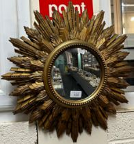 Mid century gilt wood sunburst mirror. 48cm diameter approx. (B.P. 21% + VAT)