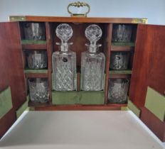 Laurence crystal decanter set comprising: two square section decanters and stoppers and a set of six