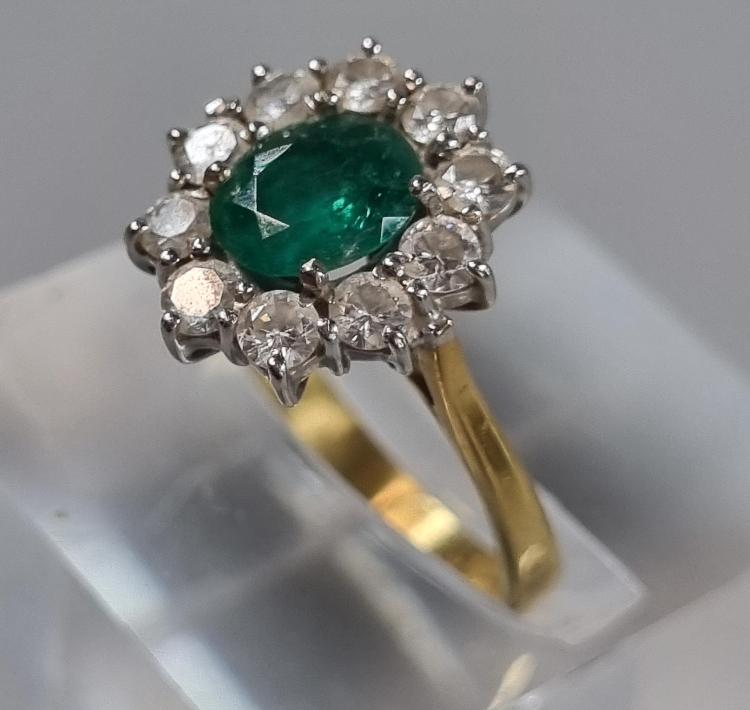 18ct gold flower head ring with ten diamonds and central emerald stone. 3.2g approx. Size J. (B.P. - Image 2 of 6