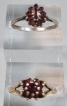 9ct gold and garnet cluster ring. 1.6g approx. Size O. Together with another cluster ring with