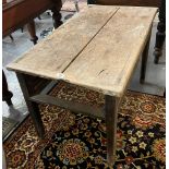 19th century pine cleated two plank top table in distressed condition. 105x60x69cm approx. (B.P. 21%