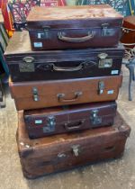 Large leather travelling trunk, two leather suitcases and two other suitcases. (5) (B.P. 21% + VAT)