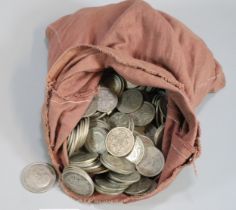 A money bag of GB silver coinage to include: mainly Half Crowns and Florins, Victorian Crown dated