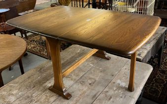 Ercol elm drop leaf table of small proportions. 102x67x46cm approx. (B.P. 21% + VAT)