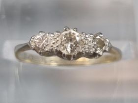 18ct gold and platinum three stone diamond ring. 1.9g approx. Size J. (B.P. 21% + VAT)