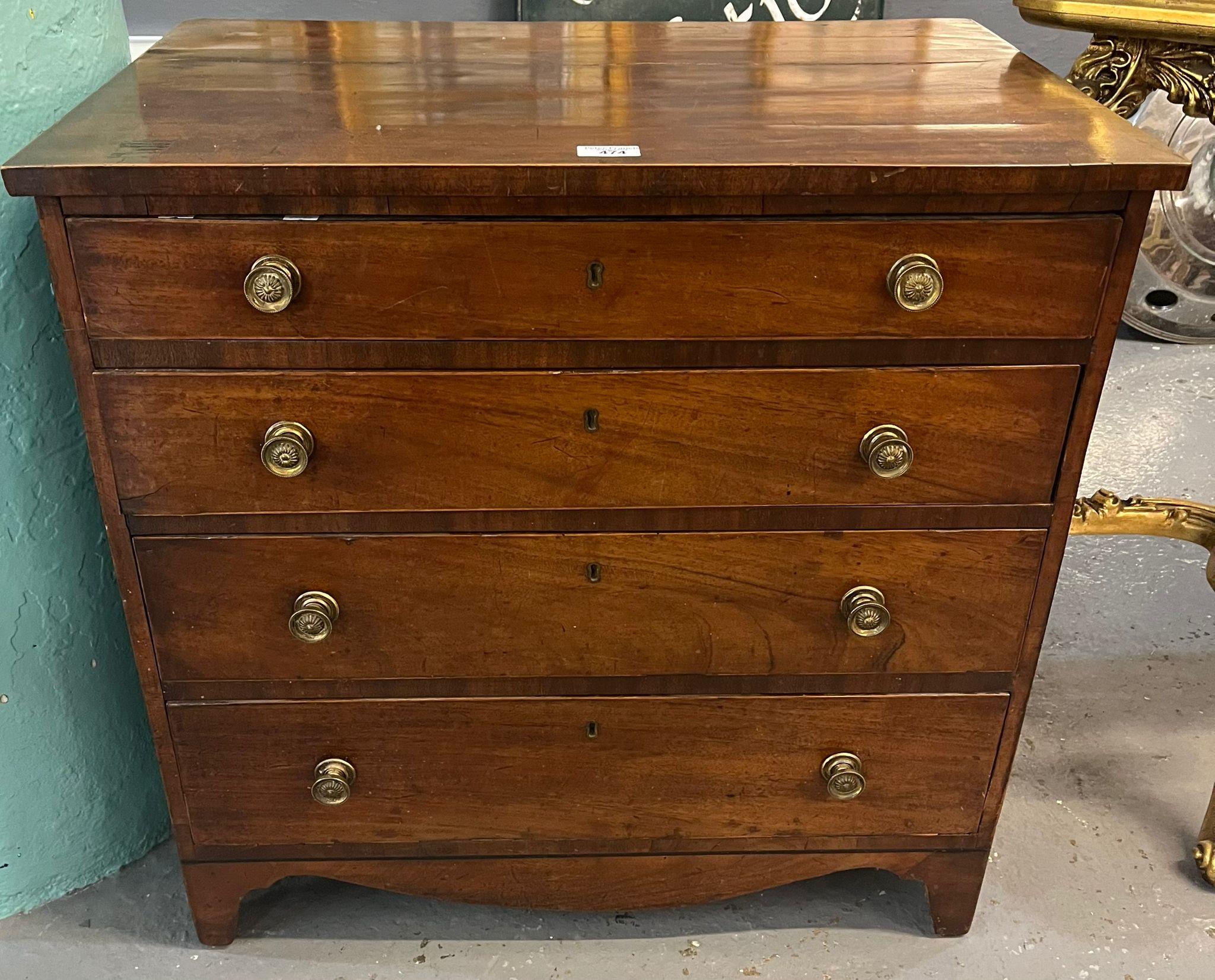 19th century mahogany straight front chest of four long drawers with brass turned handles.