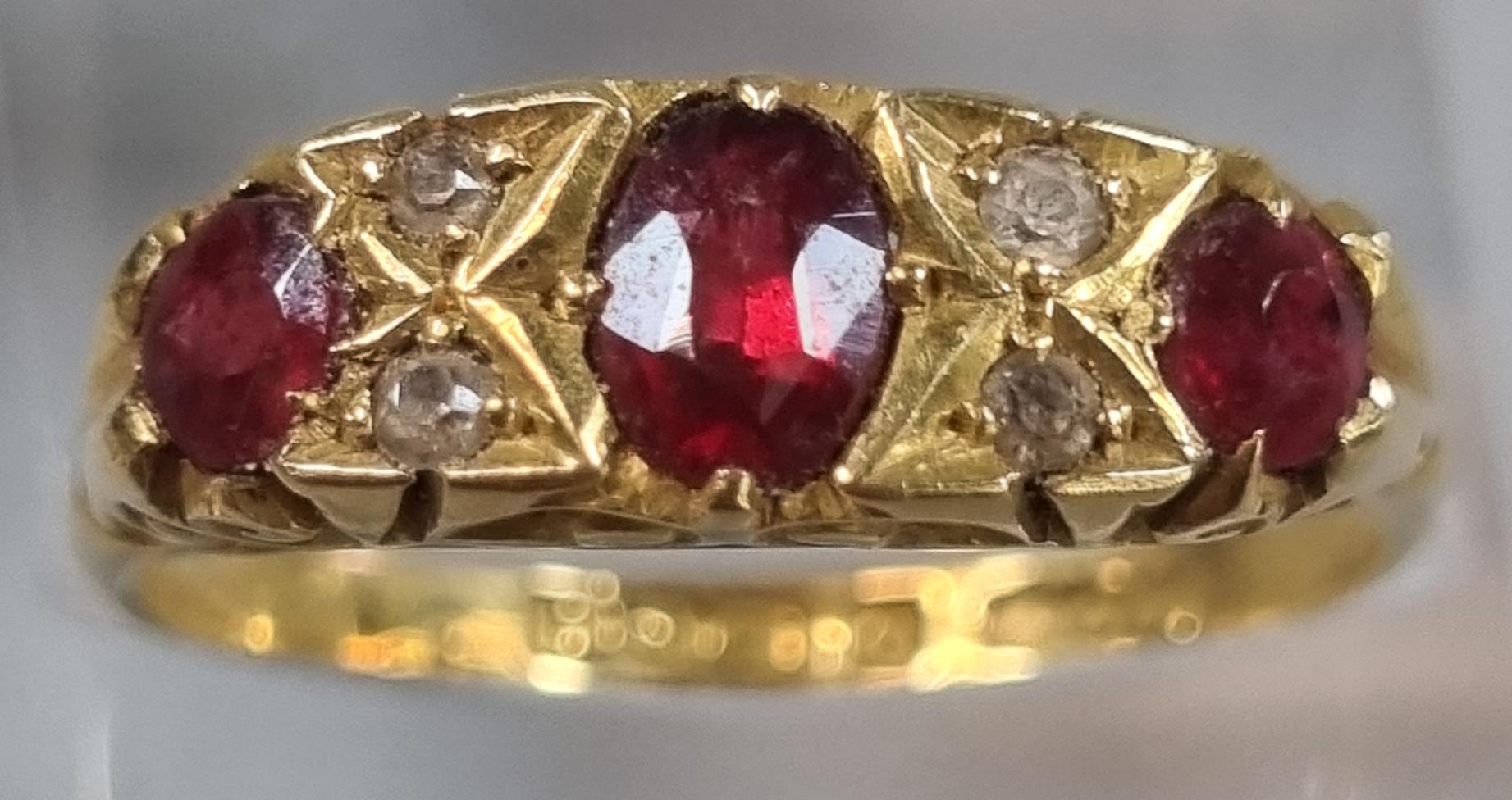 18ct gold red and white stone ring (do not test as diamonds). 3.3g approx. size Q. (B.P. 21% + VAT)