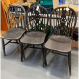 Group of eight assorted kitchen chairs to include three stained wheel back chairs, set of four ash