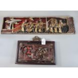 Two Chinese carved wooden polychrome panels depicting figures in an interior, the largest 55cm