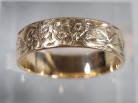 9ct gold engraved wedding band. 2.1g approx. Size K1/2. (B.P. 21% + VAT)
