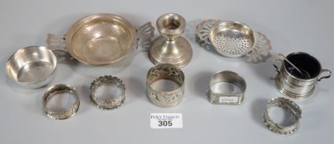 Collection of mainly silver items to include: beaten design Tastvin, various napkin rings, bowl,