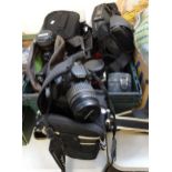 Box of cameras and accessories to include: digital camera in original box, various camera bags,