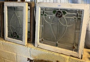 Four leaded glass window panels in wooden frames. (B.P. 21% + VAT)