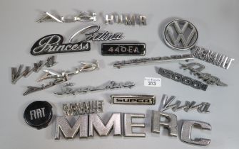 Collection of vintage and other car badges to include: Cortina, Fiat, Volkswagen, Viva, Renault etc.