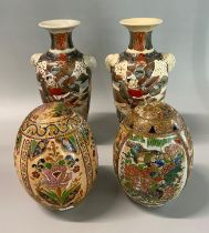 Two Chinese style polychrome ceramic eggs together wit ha pair of Japanese Kyoto Satsuma figural