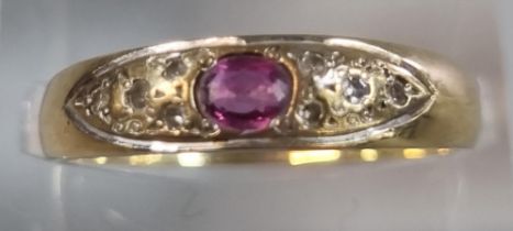 9ct gold diamond and ruby ring. 1.5g approx. Size O. (B.P. 21% + VAT)