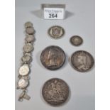 Collection of silver coins to include: two Victorian Crowns dated 1889 and 1887, half Crown, coin