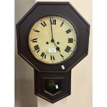 Early 20th century stained oak octagonal two train wall clock. (B.P. 21% + VAT)