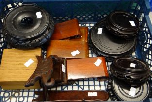 Box of carved wooden oriental stands in various woods. (B.P. 21% + VAT)