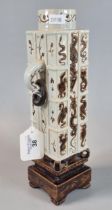 Chinese style square section vase on stand overall decorated with dragons and foliage, impressed