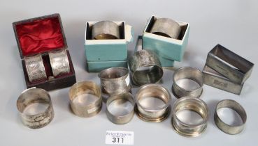 Large collection of silver engine turned and other napkin rings. 12.5 troy oz approx. (B.P. 21% +