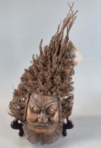 Unusual Asian/Far Eastern bamboo mask head of a man with beard and moustache. 40cm high approx. (B.
