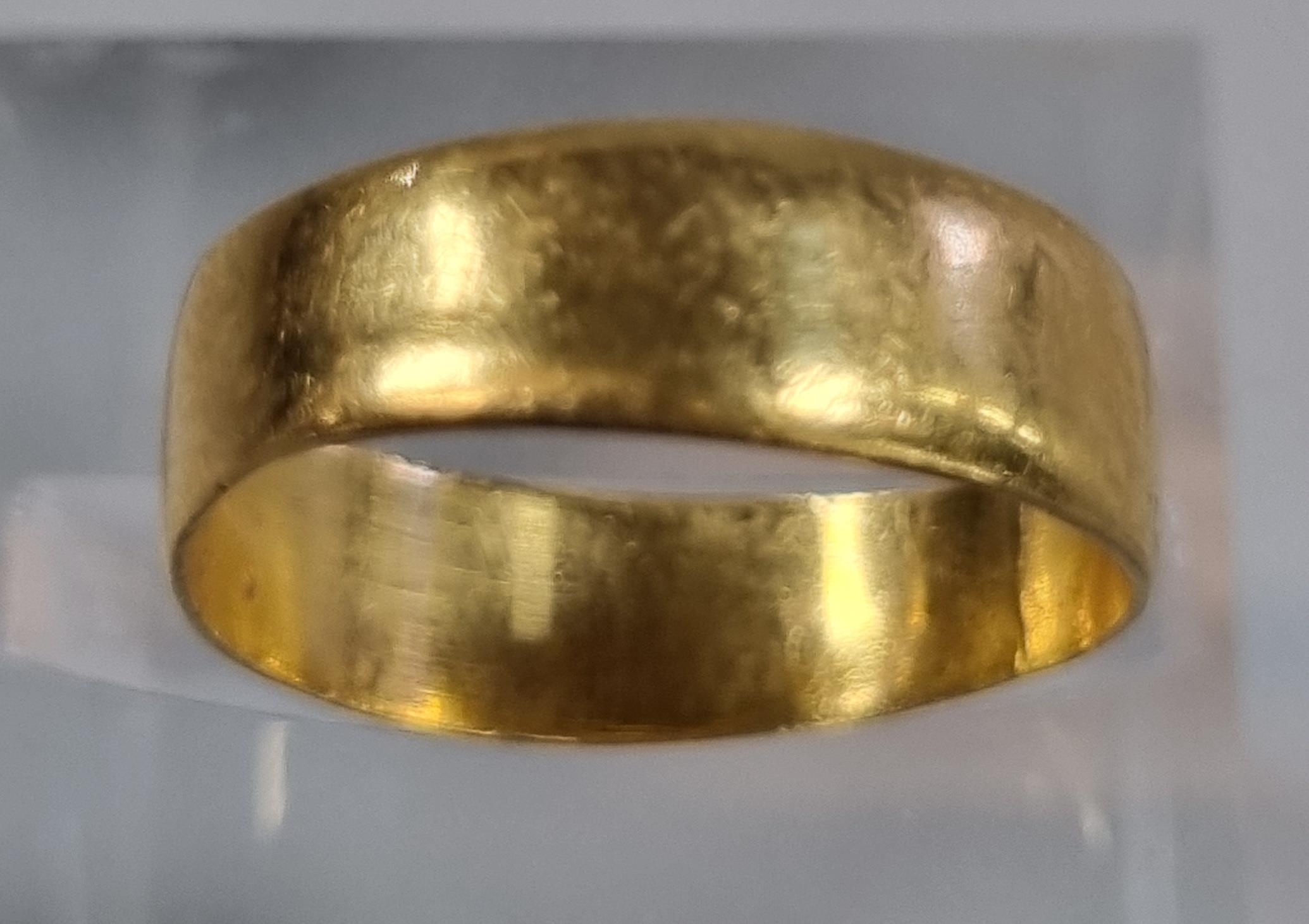 22ct gold wedding band. 2.1g approx. size K. (B.P. 21% + VAT)