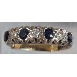 18ct white gold six stone diamond and sapphire ring. 4g approx. Size L1/2. (B.P. 21% + VAT)