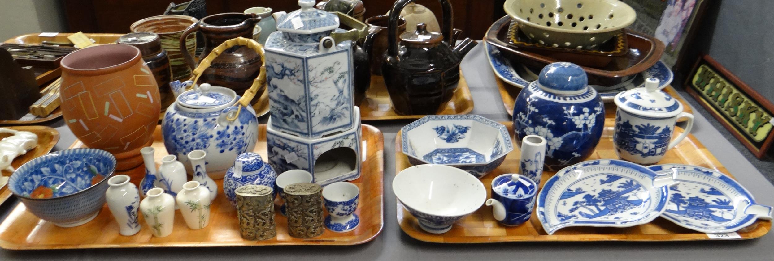 Two trays of oriental design china to include: blue and white chocolate cup with lid, prunus blossom