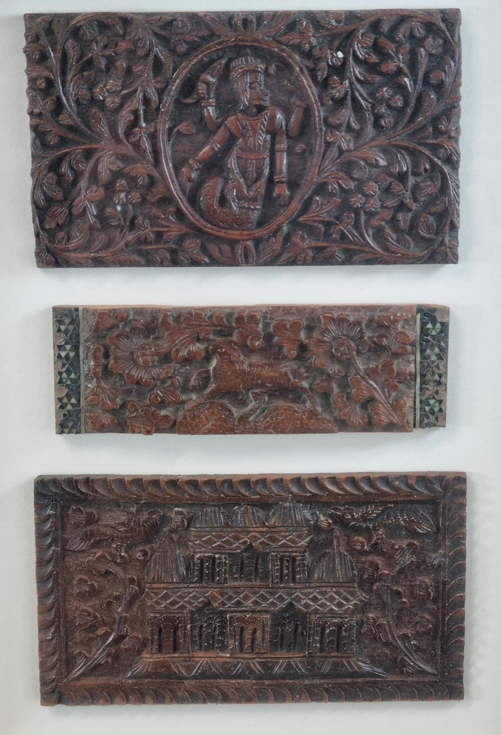 Group of appearing carved devotional figures mounted in a wooden glass fronted display frame - Image 3 of 3