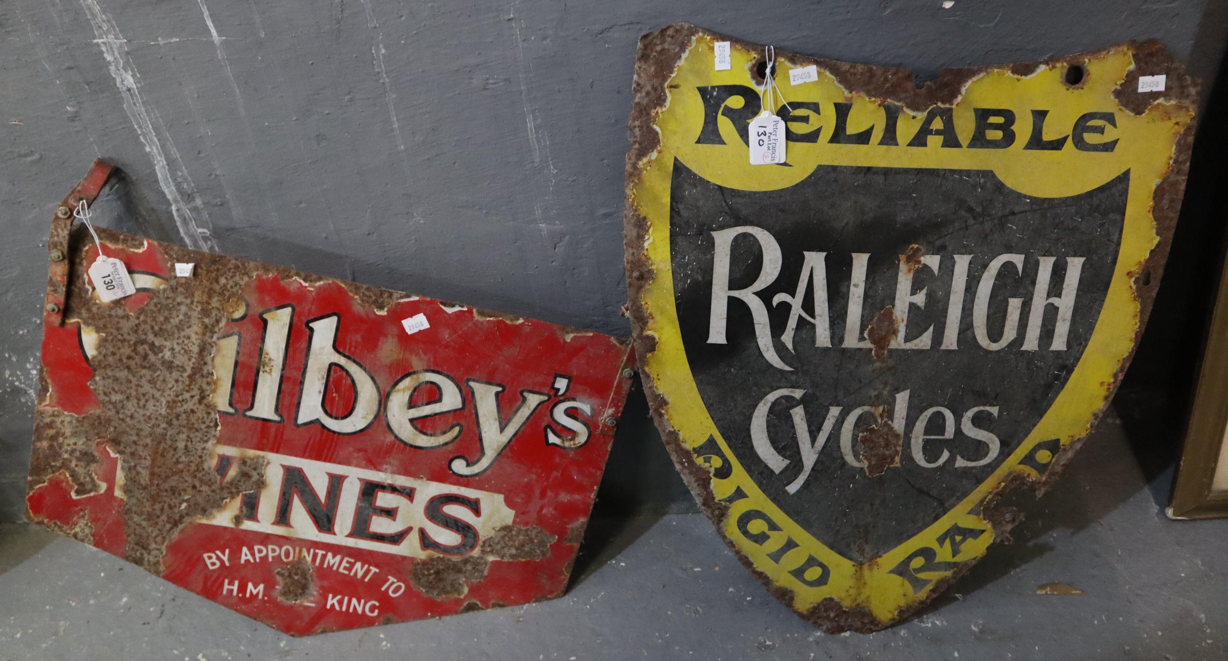 Two vintage enamel advertising signs: 'Gibley's Wines' (double sided) and 'Reliable Raleigh