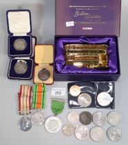 Bag of oddments to include: Corgi Queen Elizabeth II Golden Jubilee Tram in original box, two silver