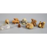Collection of carved and resin netsukes to include: frogs, monkeys, bear, buddha figurine etc. (