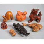 Bag of assorted carved netsukes to include: Foo Dog, hare, fish, rats, figurine of an old man