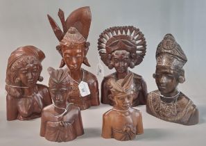 Collection of six hand carved Balinese busts. Male and female. (6) (B.P. 21% + VAT)