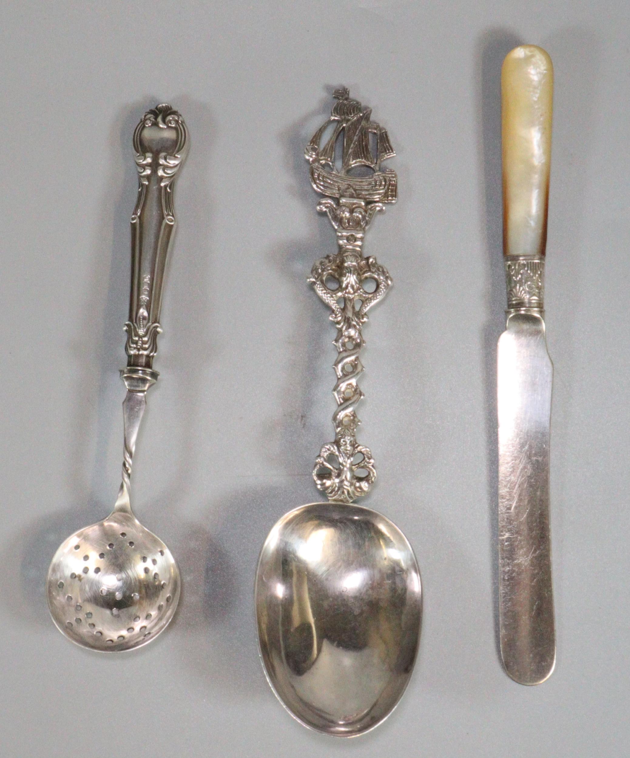 Silver, probably Dutch, spoon with import marks having ornate Naval design handle with ship terminal